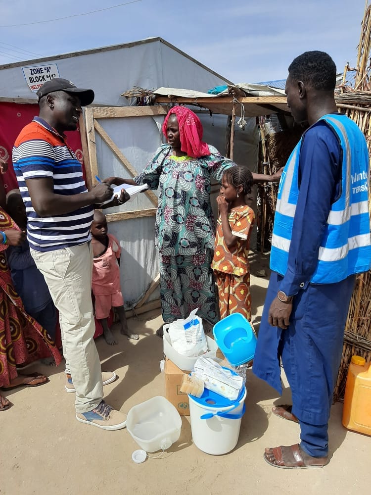 HHI field officer registering a household for a WASH hygiene kit