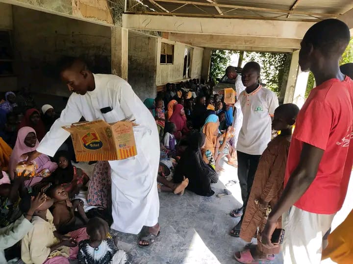Volunteers distributing relief supplies
